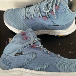 Hoka Women's Blue and white sole hiking shoes